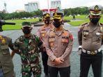 irwasda-polda-jatim-kombes-pol-m-aris-saat-pimpin-apel-operasi-keselamatan-semeru-2022.jpg