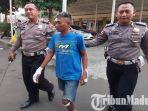 joki-balap-liar-dan-pembalap-profesional-adi-ucil-diamankan-polisi-ketika-tiba-di-polresta-sidoarjo.jpg