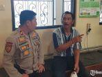 juru-parkir-pungutan-liar-di-alun-alun-kota-malang.jpg