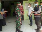 kepala-dinas-kesehatan-kabupaten-bangkalan-sudiyo-mengunjungi-sejumlah-puskesmas.jpg