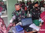 kepala-staf-kodim-0829-bangalan-mayor-inf-mahfud-mendapat-giliran-pertama-vaksinasi.jpg