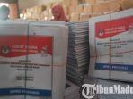 kpu-kabupaten-mojokerto-melakukan-pensortiran-dan-pelipatan-surat-suara.jpg