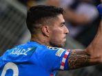 luiz-suarez-cetak-gol-kemenangan.jpg