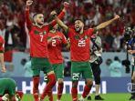 para-pemain-maroko-melakukan-selebrasi.jpg