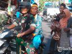personel-kodim-0826pamekasan-saat-mengantarkan-jamaah-haji.jpg