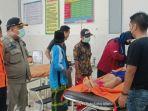 petugas-bpbd-kabupaten-bojonegoro-usai-melakukan-evakuasi-bocah-tenggelam.jpg