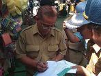 satpol-pp-dan-bkd-mengamankan-pns-yang-keluyuran.jpg