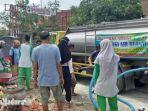 siswa-pecinta-alam-arjuna-man-1-pamekasan-dan-frpb-pamekasan-membagikan-air-bersih.jpg