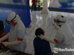 swab-test-di-gedung-isolasi-mandiri-wisma-atlet-pare-kabupaten-kediri.jpg