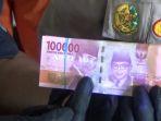 uang-palsu-pecahan-rp-100-ribu-berkedok-ritual-gaib-loker-gaib-diungkap-polisi.jpg
