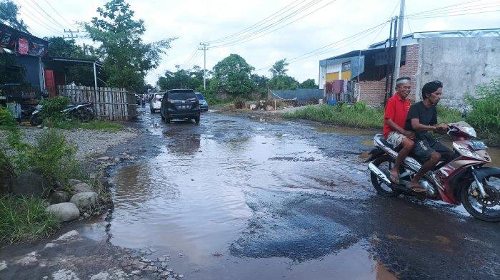 Hati-hati! Sejumlah Titik Ruas Jalan HM Yasin Limpo Gowa Berlubang