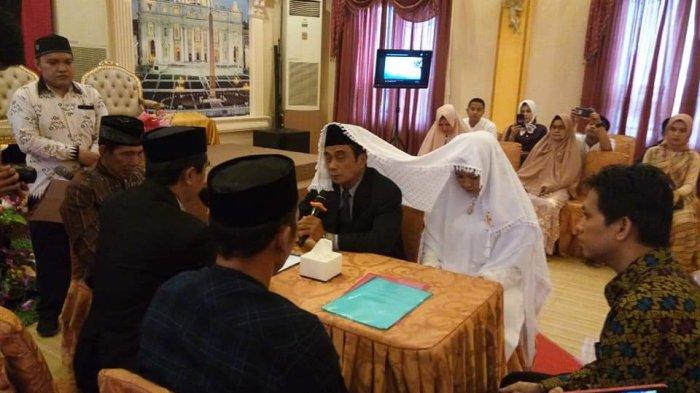 Foto-foto pernikahan Sulmankar PNS di Makassar Poligami. Undangan dibuat istri pertama