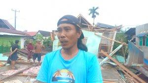PUTING-BELIUNG-Angin-puting-beliung-menerjang-puluhan-rumah-di-Desa-Dadeko.jpg