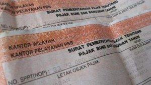ilustrasi-sppt-pajak-bumi-dan-bangunan-282021.jpg