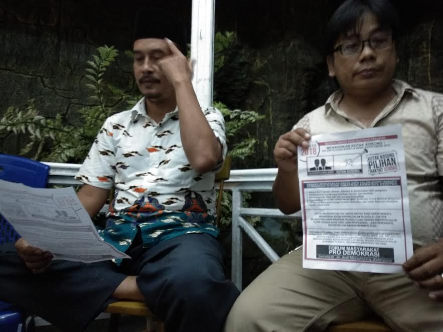 ketua-forum-masyarakat-pro-demokrasi-muhammad-naim-sosialisasi-gerakan-coblos-kotak-kosong_20180610_164139.jpg