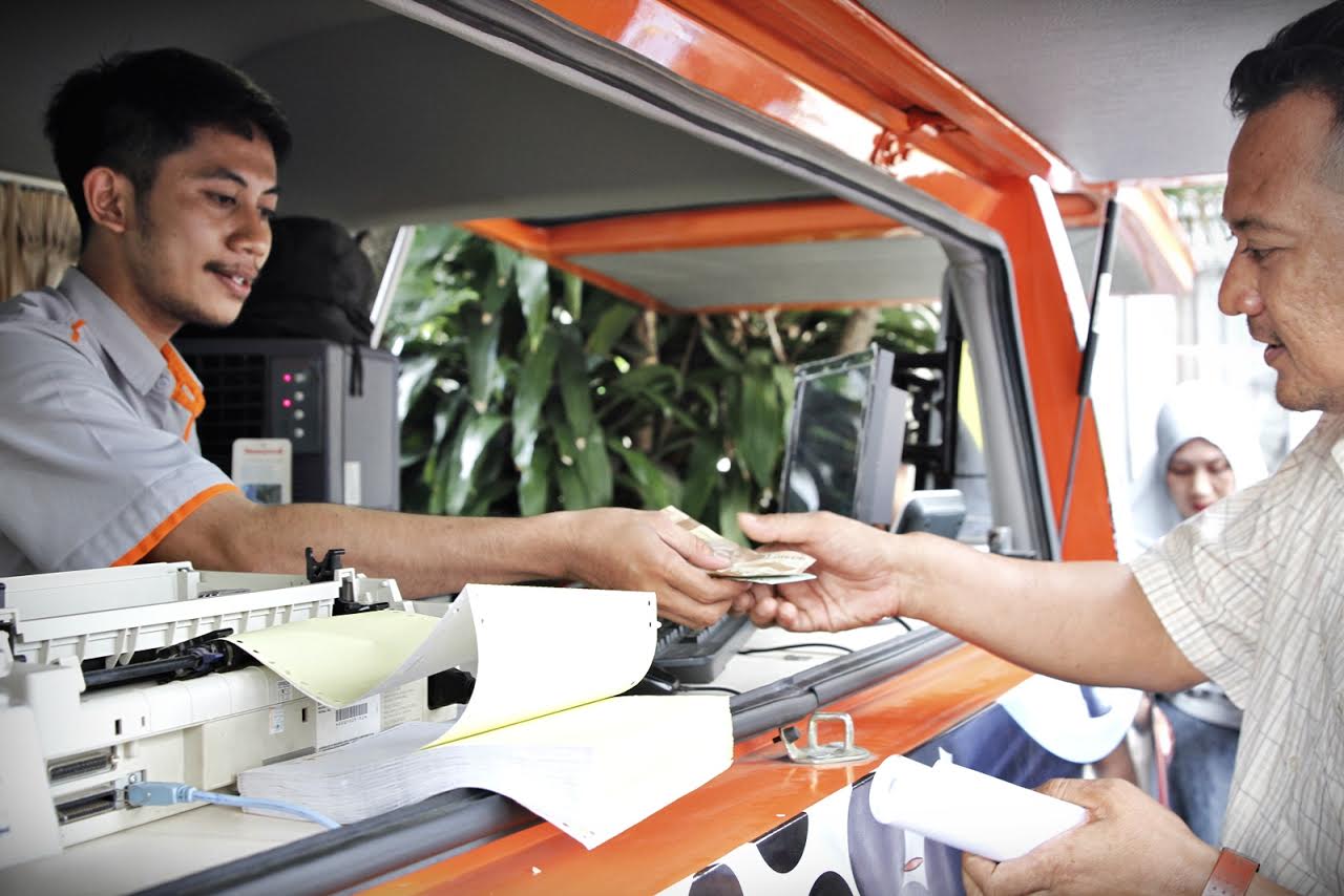 Urus Paspor Kini Tak Hanya Dilakukan di Imigrasi, Sekarang Bisa Lewat Kantor Pos, Begini Caranya