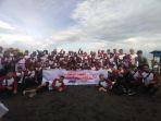 Ajendam-XIV-Hasanuddin-Andi-Masyur-bersama-Kepala-Cabang-JNE-Makassar-Suci.jpg