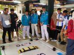 Andi-Anugrah-Sulaiman-dkk-juara-lomba-robot-tingkat-internasional-di-Malaysia.jpg