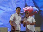 Andi-Iwan-Darmawan-Aras-menyerahkan-secara-simbolis-KTA-kepada-Syahban.jpg