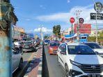 Arus-Lalu-Lintas-di-depan-Grandmall-Maros-ramai-lancar1.jpg