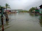 BANJIR-ROB-Banjir-rob-rendam-puluhan-rumah-di-Desa-Passimaranu.jpg