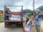 Bawaslu-dan-Satpol-PPWajo-saat-menertibkan-APK-caleg-di-Jl-Sawerigading.jpg