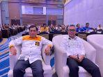 Bupati-Luwu-Timur-Budiman-duduk-berdampingan-AM-Nurdin-Halid.jpg