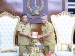 Bupati-Luwu-Timur-Budiman-mengantarkan-langsung-undangan-ke-Pj-Gubernur-Sulse.jpg
