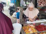 Fitra-salah-satu-pedagang-cabai-di-Pasar-Sentral-Pattalassang-Takalar.jpg