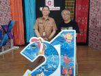 HUT-TRIBUN-Kabid-Humas-Pemprov-Sulsel-kiri-saat-foto-bersama.jpg