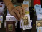 Harga-logam-mulia-atau-emas-batangan-PT-Aneka-Tambang-Tbk-Antam-Turun-9-ribu.jpg