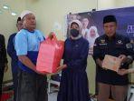 Hasnah-Syam-salurkan-nasi-kotak-untuk-menu-buka-puasa-kepada-Rutan-Kelas-II-B-Barru.jpg
