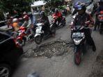 Ilustrasi-jalan-rusak-errr.jpg