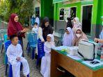 Imunisasi-campak-bagi-murid-SD-Islam-Terpadu-Darussalam-1-2772022.jpg