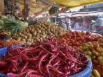 Ket-foto-HARGA-PANGAN-Potret-Pedangan-di-Pasar-Terong.jpg