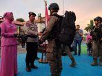 Nana-Sudjana-melepas-105-personel-Brimob-ke-Papua.jpg