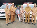 PENYERAHAN-AMBULANS-Bupati-Maros-Chaidir-Syam-menyerahkan-secara-simbolis.jpg