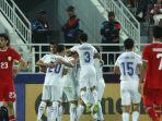 Para-pemain-Uzbekistan-melakukan-selebrasi-menyusul-gol-bunuh-diri.jpg