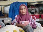 Pedagang-beras-di-Maros-Siti-Aminah-mengatakan-kenaikan-terjadi.jpg
