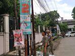 Petugas-Satpol-PP-tertibkan-APK-paslon-di-Jl-Jenderal-Hertasning.jpg