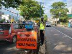 Polisi-atur-lalu-lintas-di-Jalan-Poros-Maros-Makassar-h.jpg