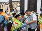 Ratusan-Jemaah-Calon-Haji-JCH-kloter-41-makassar-v.jpg