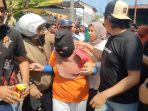 Saat-tersangka-pembunuh-nenek-Tarimah-66-dikawal-polisi-seusai-rekonstruksi.jpg