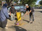 Semarak-Kirab-Pemilu-2024-KPU-Makassar-Bersih-bersih-Pantai-Losari-Sambil-Sosialisasi.jpg
