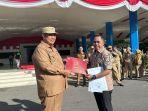 Surat-keputusan-SK-pemberhentian-sebagai-ASN-Andi-Rosman.jpg