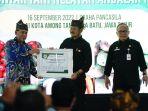 Syahrul-Yasin-Limpo-saat-mendapatkan-tanda-kehormatan-16092022.jpg