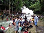 Taman-Wisata-Alam-Bantimurung-Maros-dipadati-pengunjung-yang-hendak-menikmati-libur-lebaran.jpg