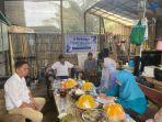 Tim-dosen-Unismuh-Makassar-membantu-membangun-Rumah-Vertikal-Kepiting.jpg