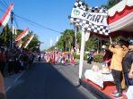 Wakil-Bupati-Gowa-Abd-Rauf-Malaganni-saat-melepas-86-sekolah-gerak-jalan.jpg