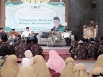 Wakil-Menteri-Agama-RI-Zainut-Tauhid-Saadi-didampingi-Bupati-Gowa.jpg